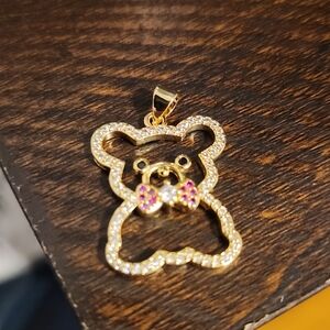 Elegant Gold Bear Charm with Pink Accents